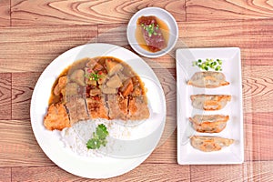 Rice,fried fish,curry, stuffing flour .