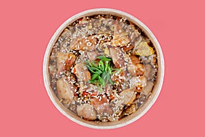 rice fried meat on a red background, studio shot