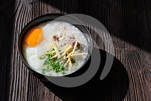 Rice gruel or congee with egg ,pork and vegetable
