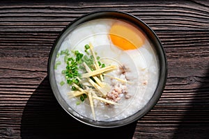 Rice gruel or congee with egg ,pork and vegetable