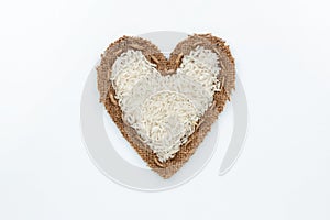 Rice lies at the heart made of burlap