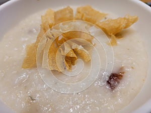 Rice Lugaw Served Hot with Strip of Cassava