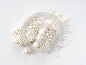 Rice malt placed against a white background. Koji mold