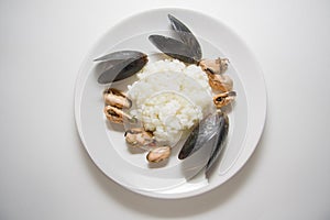 Rice with marinated mussels studio shot