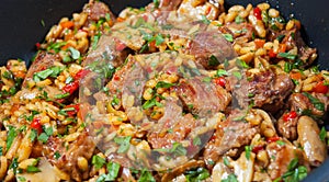 Rice with meat, vegetables and mushrooms