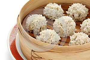 Rice meatballs in the bamboo steamer , chinese fo