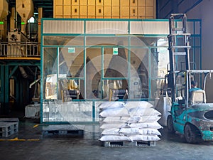 Rice milling plant, milled rice bag packing station. Rice processing plant.
