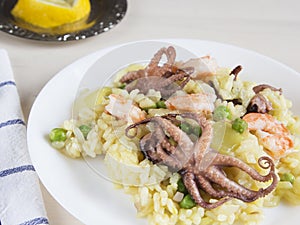 Rice with mini octopuses and green peas