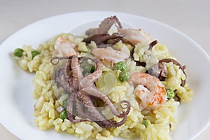 Rice with mini octopuses and green peas