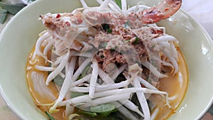 Rice noodke with fush curry sauce crab photo