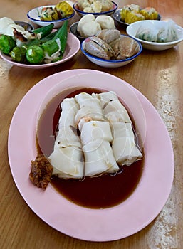 Rice noodle roll on a plate served as dim sum