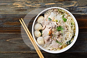 Rice noodles soup with pork and meat ball in a bowl
