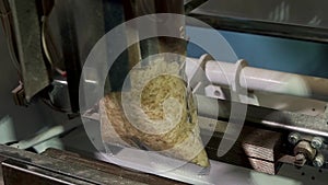 Rice in a packing machine close up