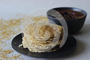 Rice pancakes made with foxtail millets flour. An experimental version of a popular Kerala dish called kallapam served with Chana