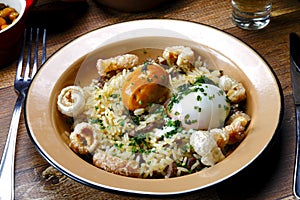Rice with Pequi, crackling and boiled