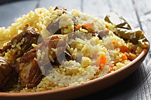 Rice pilaf with lamb closeup
