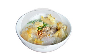 Rice porridge or Congee with white deep-fried doughstick or sugar sponge cake