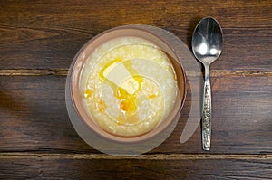 Rice porridge with pumpkin and butter