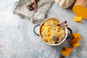 Rice porridge with pumpkin cooked with vanilla and spices