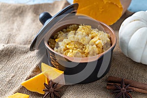 Rice porridge with pumpkin cooked with vanilla and spices