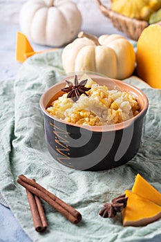 Rice porridge with pumpkin cooked with vanilla and spices