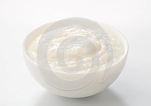 Rice porridge in white bowl photo