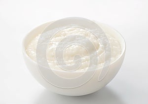 Rice porridge in white bowl