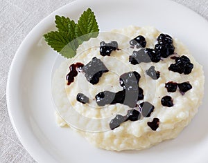 Rice pudding with blueberry cream