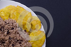 Rice with red beans and tostones