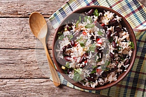 Rice with red beans and vegetables in a bowl. horizontal top vie photo