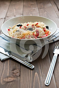 Rice with red capsicum and black olives