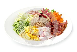 Rice seasoned with shrimp paste or rice mix slice of red onion, bean,mango, fried egg, Thai food