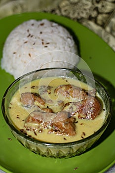 Rice served with Curry or Boiled Rice and Curry or Food Photography or Pakora Curry or Asian Cuisine or Karhi