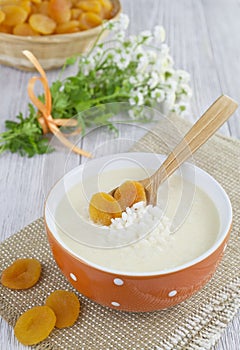Rice soup with cream and dried apricots