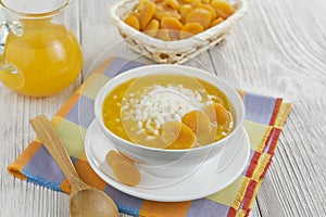 Rice soup with dried apricots