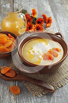 Rice soup with dried apricots