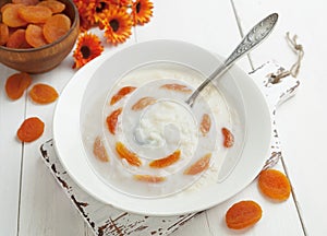 Rice soup with dried apricots