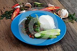 Rice with stir-fried minced pork and basil with cucumber