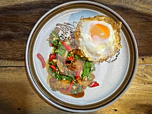 Rice topped pork with Thai basil and fried egg