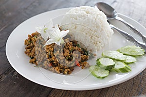 Rice topped with Stir Fried Pork with yellow curry paste