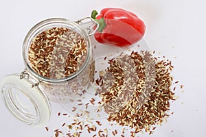 Rice in a transparent jar with lid yoke, Bulgarian pepper