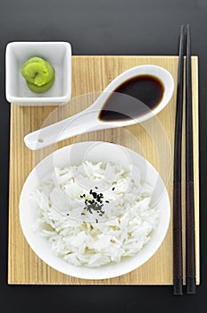 Rice with wasabi and chopsticks