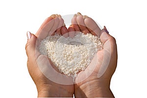 Rice in woman's hands.