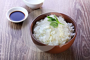 Rice on wooden background