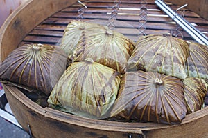 Rice wrapped in lotus leaf on sale