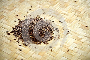 Riceberry on Bamboo weave background.