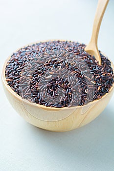 Riceberry in white spoon