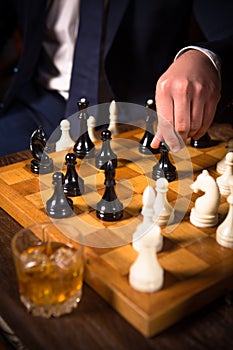 Rich businessmen playing chess