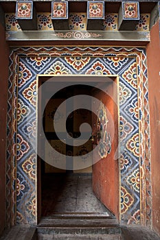Rich decorated door - Trongsa Dzong in Bhutan