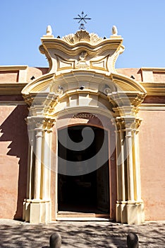 Rich decorated entrance gate of monastery Juan de Tejeda in Cordoba, Argentina, South America
